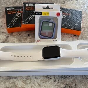 Apple Smartwatch Case with White Band comes with 7 tempered glass cover.